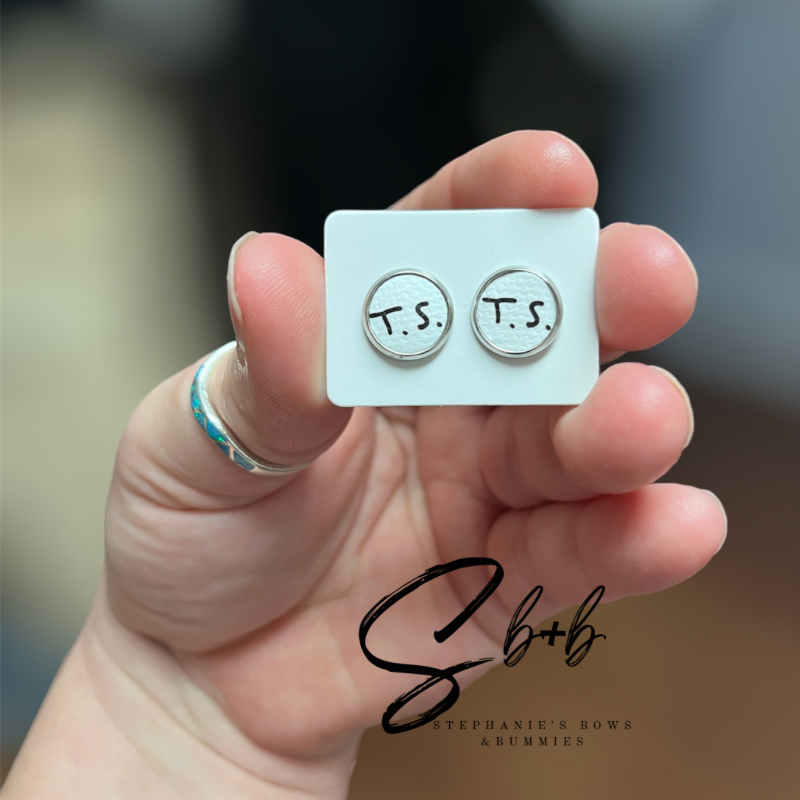 T. S. Stud Earrings