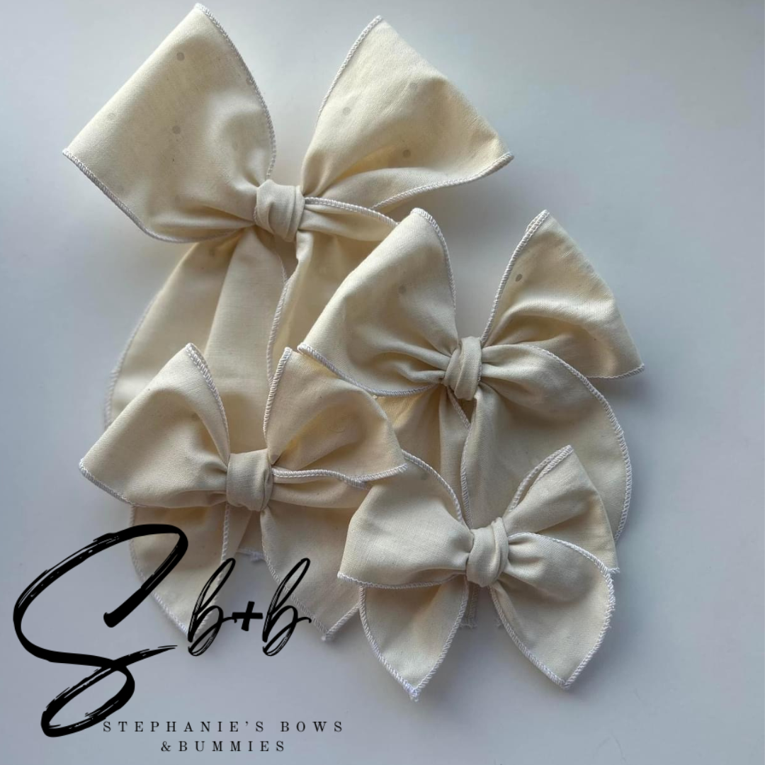 Cream w/ White Dots Serged Bow
