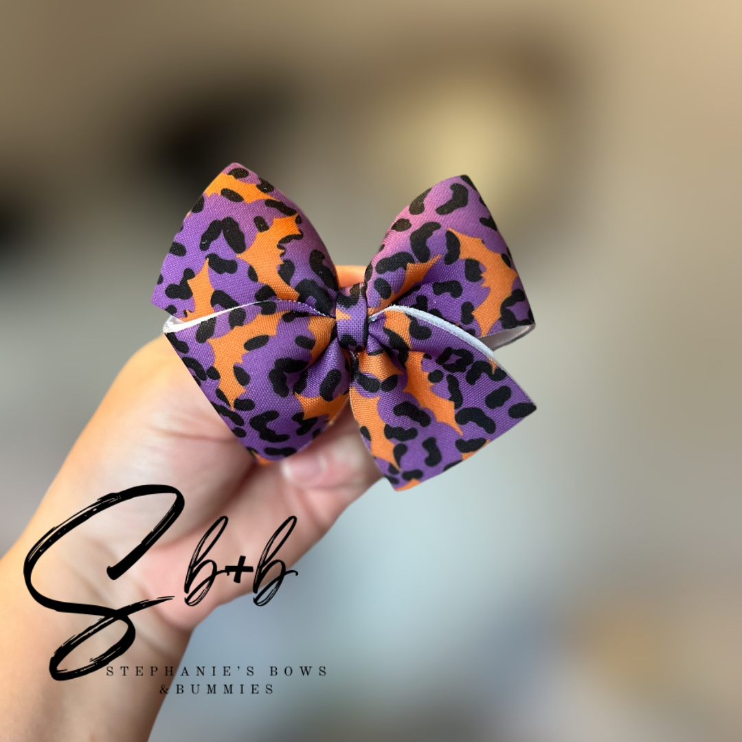 Purple and Black Cheetah w/  Orange Bats