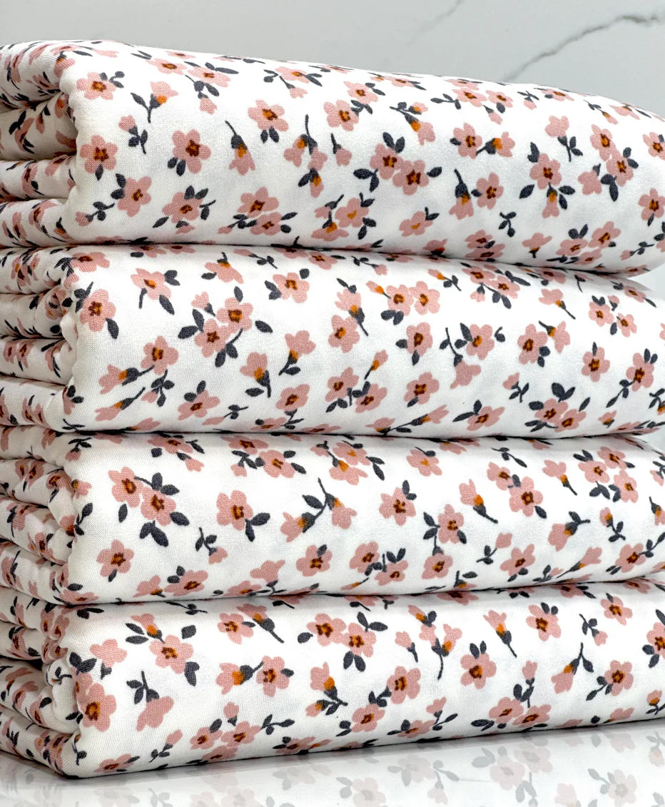 White w/ Light Mauve Flowers Fabric