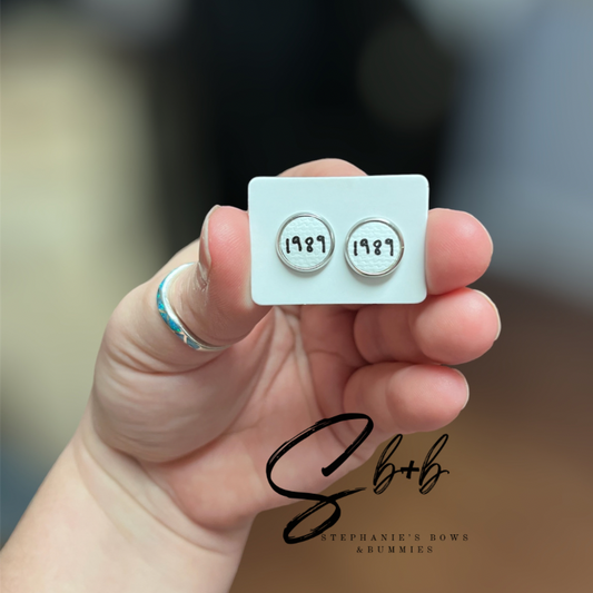 T. S. 1989 Stud Earrings