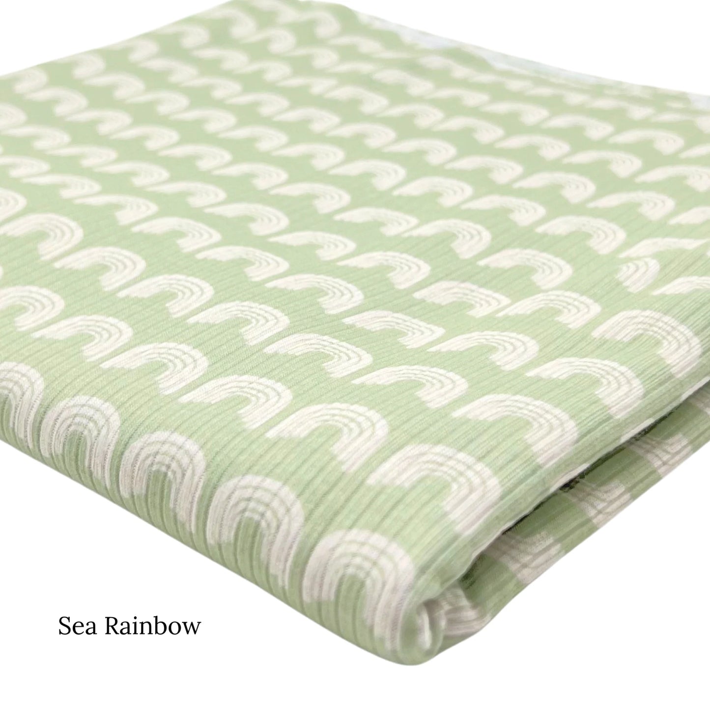 White Rainbow on Light Green Fabric