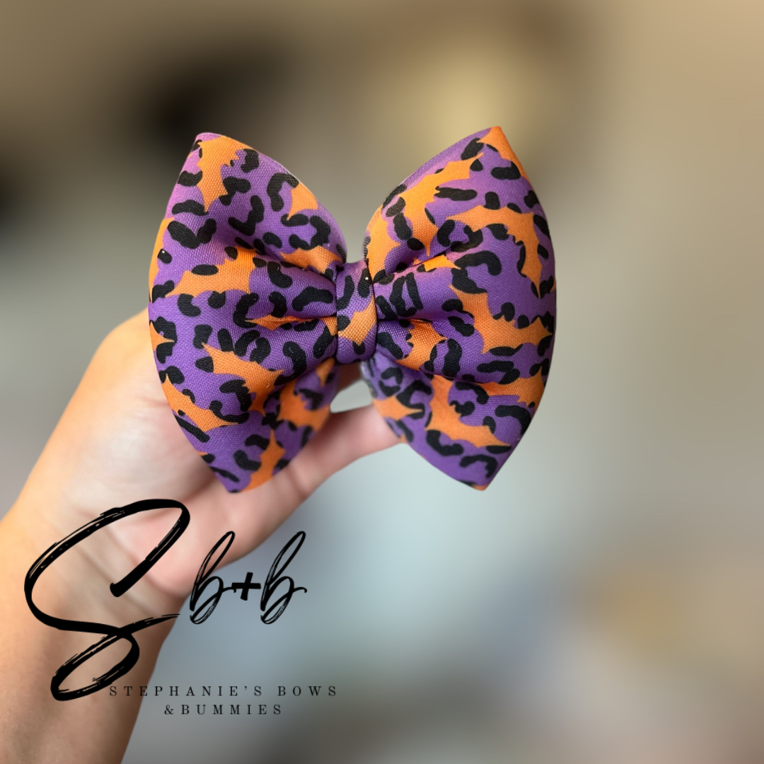 Purple and Black Cheetah w/  Orange Bats